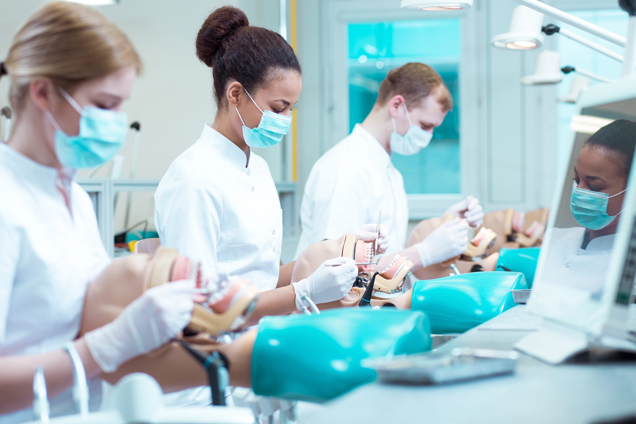 Dental team participating in a hands-on continuing education class